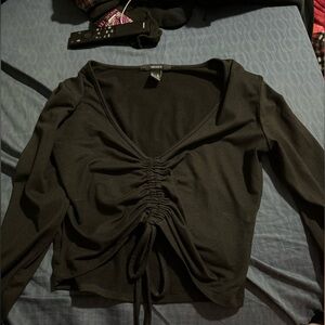 black crop top adjusting front